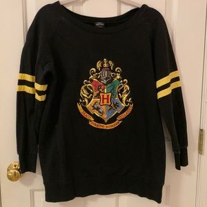 Black shirt with Hogwarts crest (from Harry Potter)